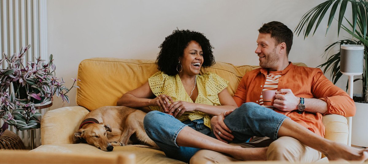 couple-sitting-on-sofa-having-quality-time